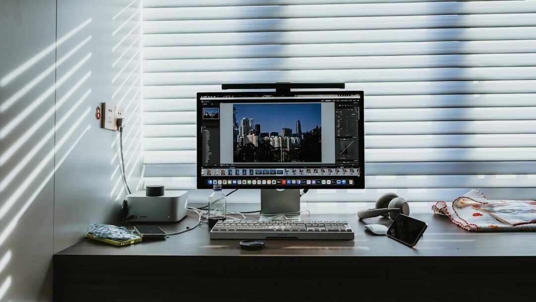 video editor at computer desk