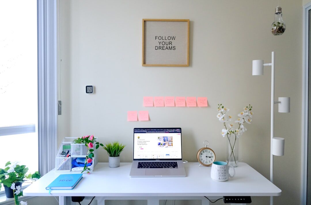 Bright modern office workspace with a desk and plants